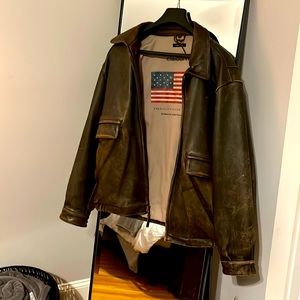 Claiborne leather jacket. I believe it’s a large but see photo. Pebble grain